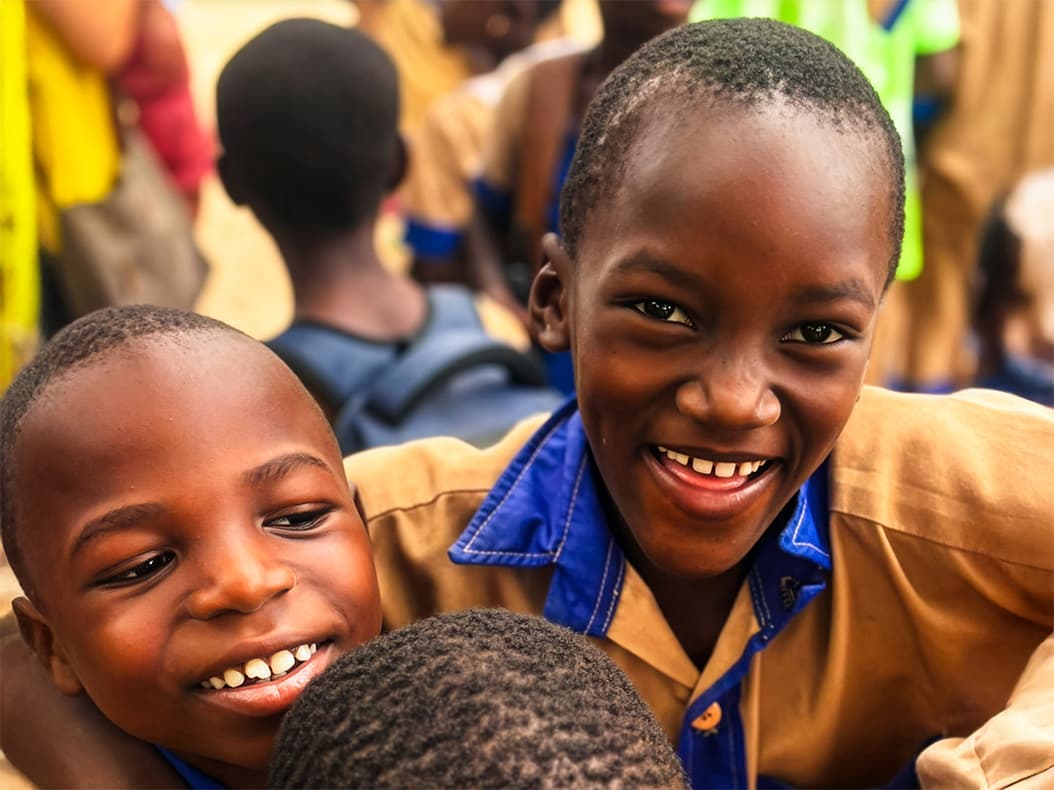 Corporate Social Responsibility & Non Profit Advisory service image showing a group of happy African children.